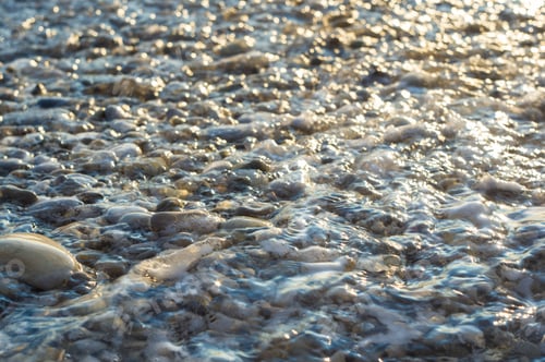 Preview: Pebble Stones On The Sea Beach, The Rolling Waves Of The Sea With Foam