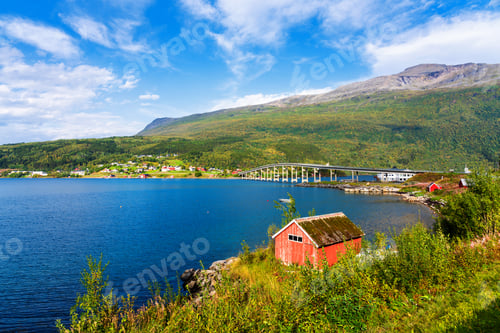 Preview: Norwegian Coast Landscape With A Typical Red House. Wooden Red Houses Are Called Rorbu Or Rorbuer