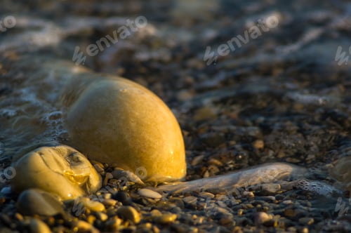 Preview: Pebble Stones On The Sea Beach, The Rolling Waves Of The Sea With Foam