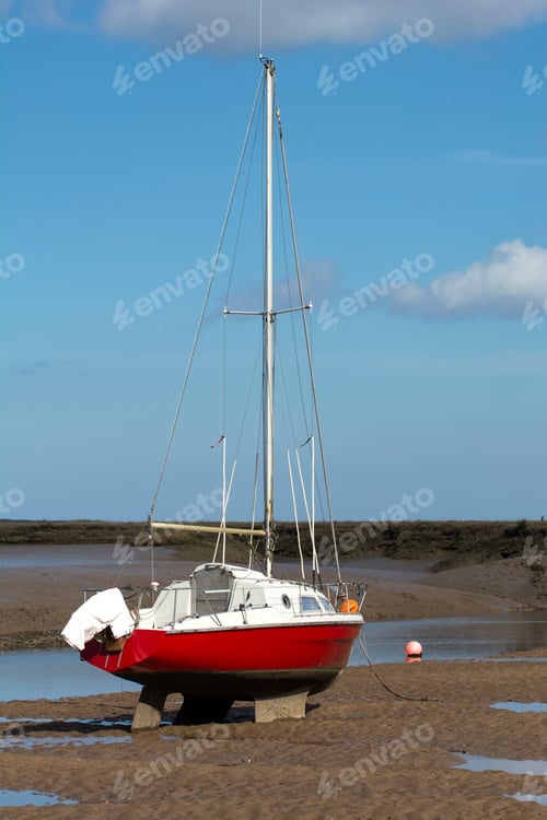 Preview: Small Boats Stranded At Low Tide At Wells Next The Sea, Norfolk, Uk