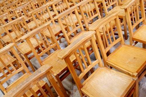 Preview: Huge Group Of Wooden Chairs Arranged In Rows.