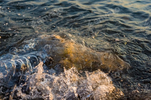 Preview: Pebble Stones On The Sea Beach, The Rolling Waves Of The Sea With Foam