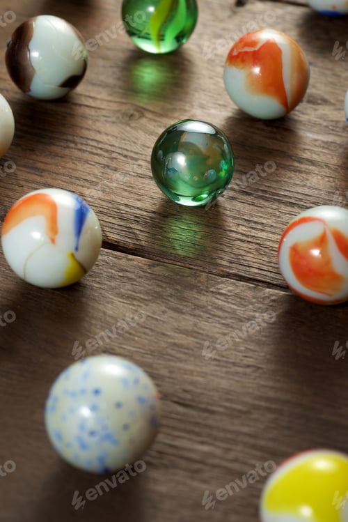 Preview: Glass Balls On A Wood Table.