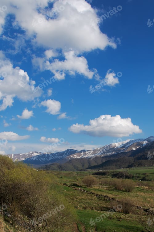 Preview: Spring Landscape With Fluffy Clouds