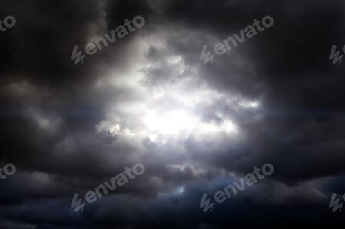 Preview: Light In The Dark And Dramatic Storm Clouds