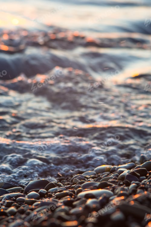 Preview: Pebble Stones On The Sea Beach, The Rolling Waves Of The Sea With Foam