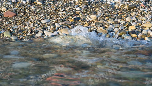 Preview: Pebble Stones On The Sea Beach, The Rolling Waves Of The Sea With Foam