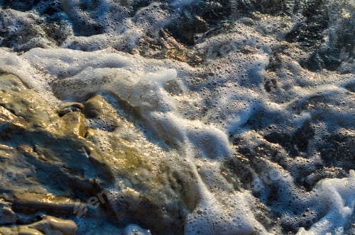 Preview: Pebble Stones On The Sea Beach On A Warm Summer Day, The Rolling Waves Of The Blue Sea With White