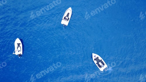 Preview: Aerial Birds Eye View From Drone Of Boats Cruising In Deep Blue Sea