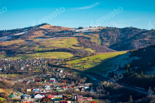 Preview: Village In A Valley. November Weather. Grassy Rural Fields On Hills Above Settlement. Lovely Sunny