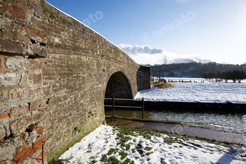 Preview: Old Stone Bridge Over A Canal In Winter