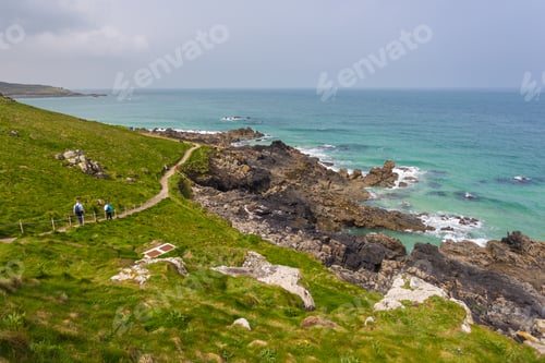 Preview: View On The Coast Of Cornwall With Cliff, Path And Cloudy Sky, Saint Ives, Uk