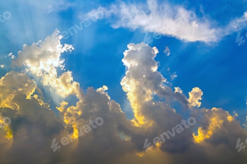 Preview: Clouds Illuminated by Sunlight Against a Blue Sky