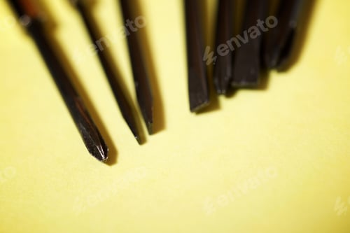 Preview: Screwdrivers On A Yellow Table