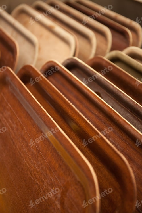 Preview: Row Of Wooden Trays Used For Carrying Plates With Food In A Canteen