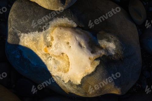 Preview: Boulders And Colorful Pebbles On The Beach