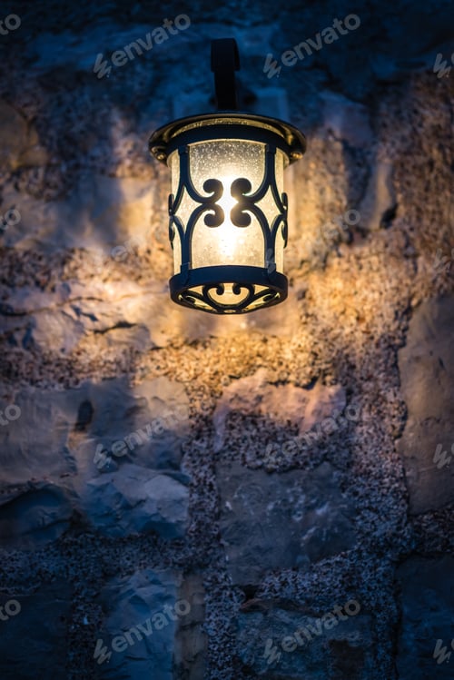 Preview: Small Lamp On The Wall Outside Local Cafe At Night In Petrovac, Montenegro