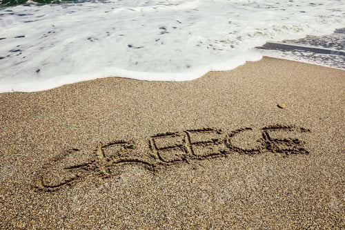Preview: The Word Greece Written In The Sand On Beach