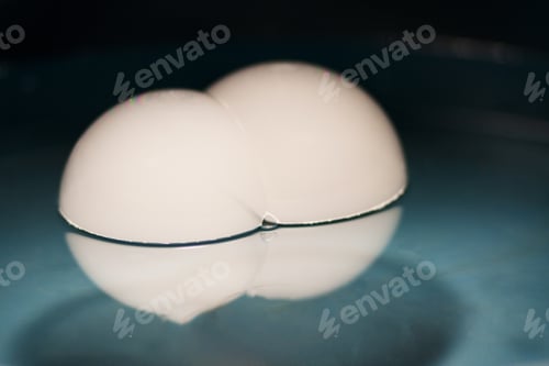 Preview: Abstract Shot With Big Soap Bubbles On A Water Surface With Smoke Inside. Image Has Grain Texture