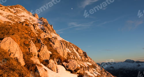 Preview: Sunset In The Mountains Above Pecol Meadow In Italy Above Mountain Pass Sella Nevea.