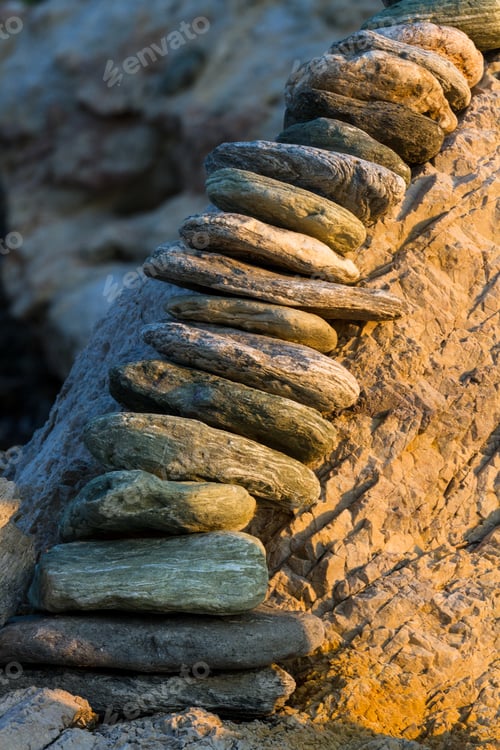 Preview: Stones Pyramides On The Beach In Sunset