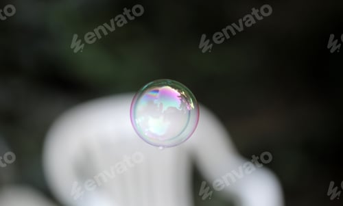 Preview: Photo With Room For Text - Single Round Air Bubble With A Colorful House And Trees Reflection