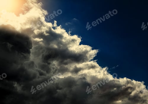 Preview: Toned Photo Of Dramatic Cloudscape Background With A Blue Sky