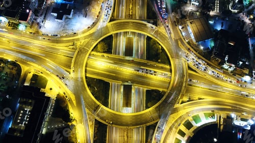 Preview: Aerial Drone Slow Shutter Night Shot Of Urban Elevated Toll Ring Road Junction And Interchange