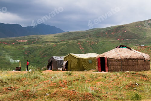 Preview: Yurts And Tents In Tian Shan Mountains Near Pamir Highway In Kyrgyzstan, Central Asia