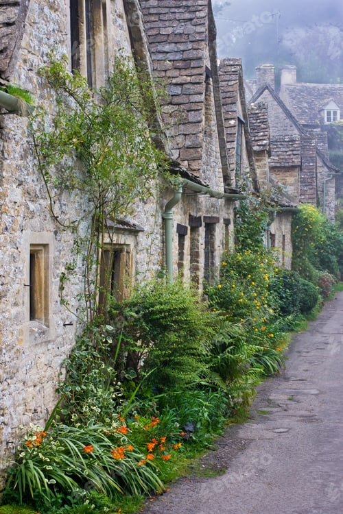 Preview: Row Of Old Buildings In English Village On Foggy Day.