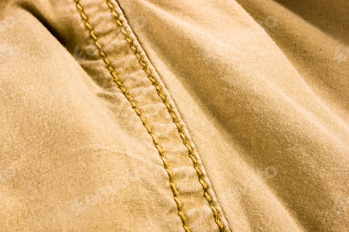 Preview: Clothing Items Stonewashed Cotton Fabric Texture With Seams, Clasps, Buttons And Rivets, Macro