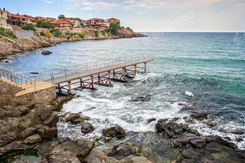 Preview: Metal Pier On The Rocky Shore Near The Old Sea Town