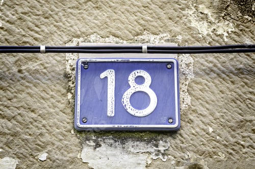 Preview: Number Eighteen, Detail Of A Number On A Wall In The City, And Figures Signal