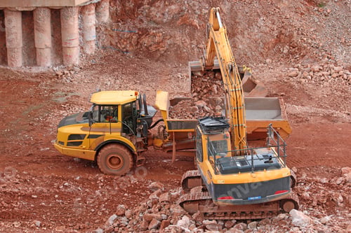 Preview: Digger Loading A Dump Truck On A Road Construction Site