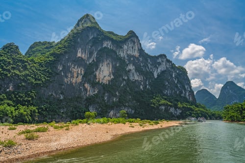 Preview: Famous Nine Horse Mural Hill Landmark Peak On The Shore Of The Magnificent Li River Flowing From