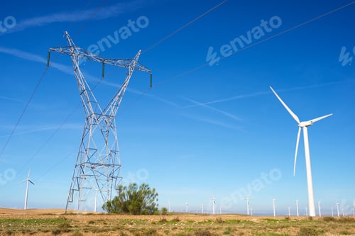 Preview: Windmills For Electric Power Production And Pylon, Zaragoza Province, Aragon, Spain.