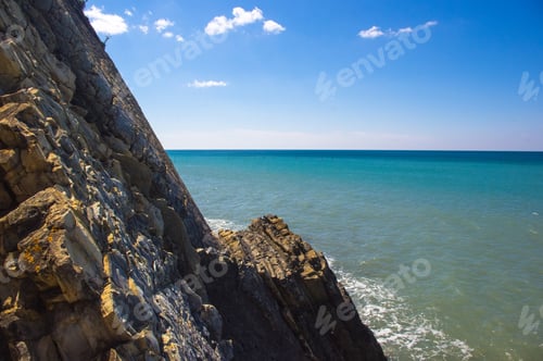 Preview: Rocky Sea Shore With Pebble Beach, Waves With Foam