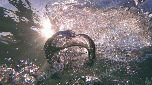 Preview: Underwater Bubbles With Sunlight Through Water Surface As Seen In Natural Scene At Caribbean