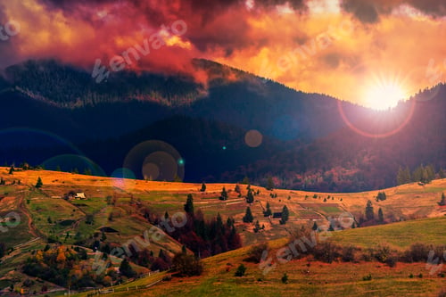 Preview: Autumn Landscape. Forest On A Hillside Covered With Red And Yellow Leaves. Over The Mountains In
