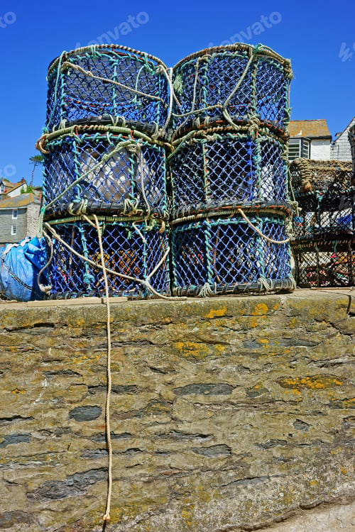 Preview: Lobster Pots On A Harbor Wall In The Cornish Fishing Village Of Port Isaac, Cornwall, United Kingdom