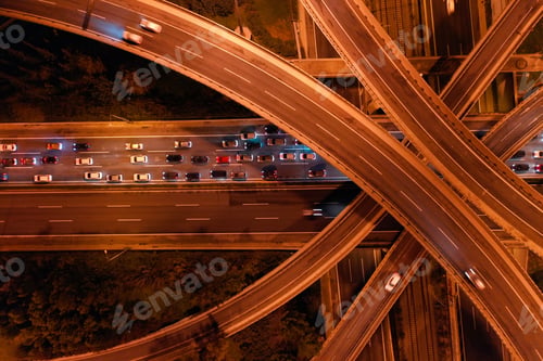 Preview: Aerial Drone Night Shot Of Multilevel Junction Highway Crossing National Road During Rush Hour With