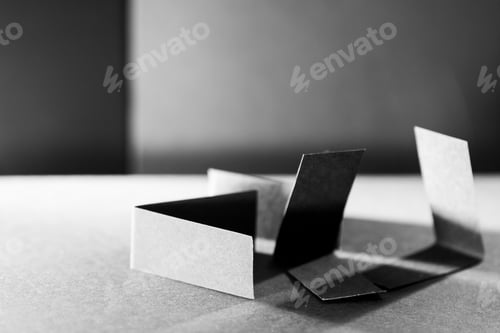 Preview: Black Paper Shapes And Shadows With Paper Background