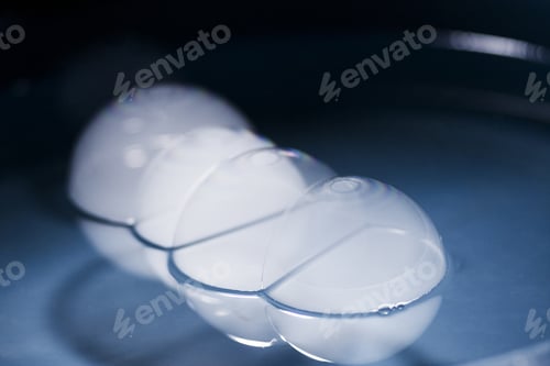 Preview: Abstract Shot With Big Soap Bubbles On A Water Surface With Smoke Inside. Image Has Grain Texture