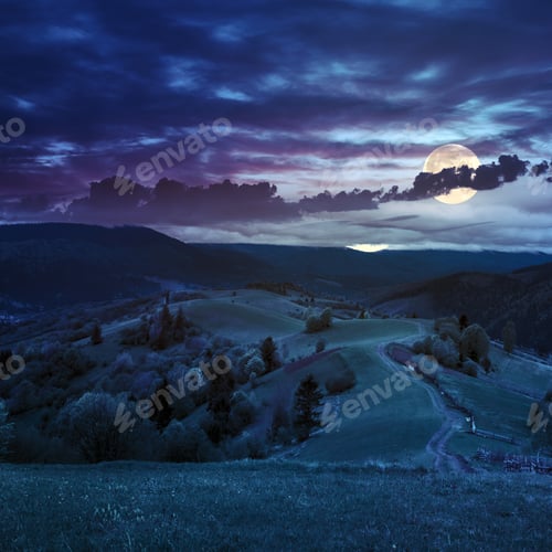 Preview: Summer Landscape. Fence Near The Meadow Path On The Hillside. Forest In Fog On The Mountain At