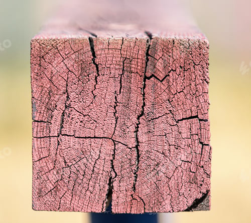 Preview: Square Beam Of Wood, Splits And Annual Rings, Texture Background. Detail Shot Of A Red Wooden Beam.