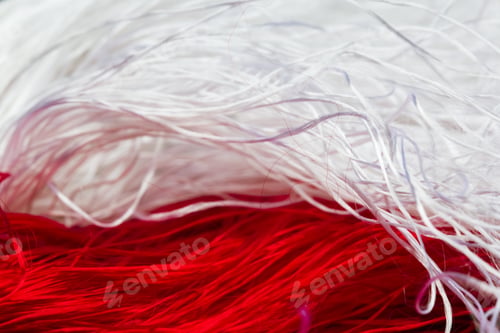 Preview: Red And White Textile Fibers From Pompons