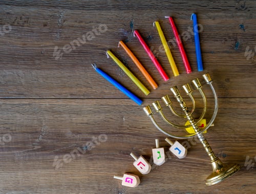 Preview: Hanukkah Menorah With Candles And Dreidels On Wood Deck.