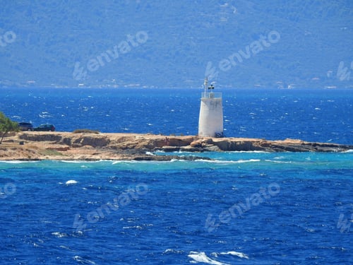 Preview: Extreme Zoom Photo From Iconic Lighthouse Near Port Of Aegina Island With Clear Blue Waters