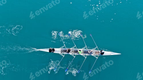 Preview: Aerial Drone Bird'S Eye View Of Sport Canoe Operated By Team Of Young Women In Emerald Clear Sea
