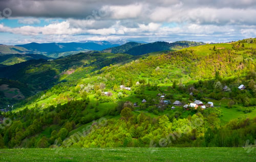 Preview: Village On A Forested Hillside In Springtime. Beautiful Rural Scenery Of Carpathian Mountains On A